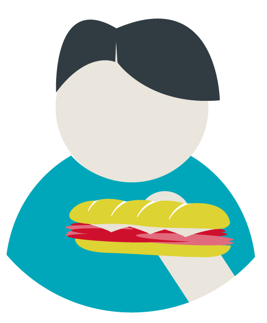Man holding a sub sandwich